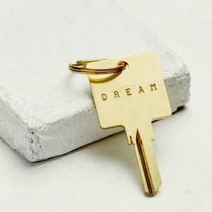 Giving Keys Hotel Keychain - hand stamped word “DREAM”